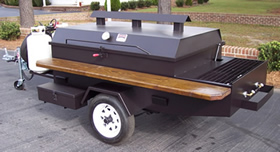 Custom pig roaster with side burners