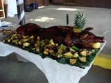 Fully dressed slow roasted pig